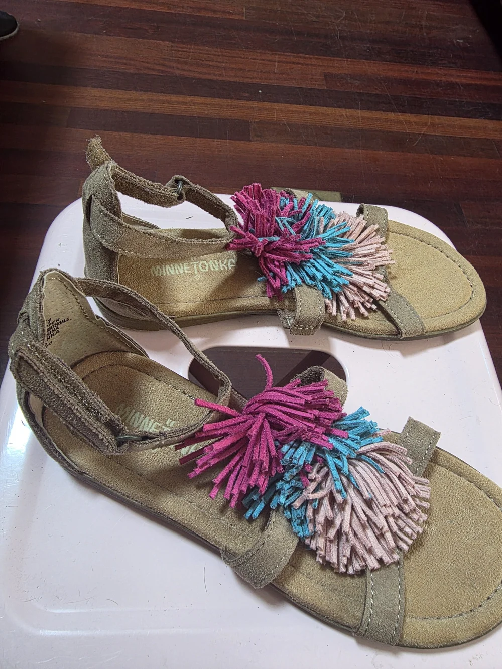 Minnetonka Girls Tan Suede Sandals with Pink, Blue & Light Pink Pom Pom Accents